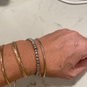 Dodo Italy 925 and 18K bracelet with a variety of components